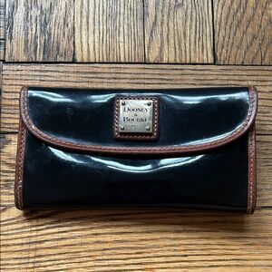 Dooney & Bourke Black Patent Leather Continental Wallet with Brown Trim
